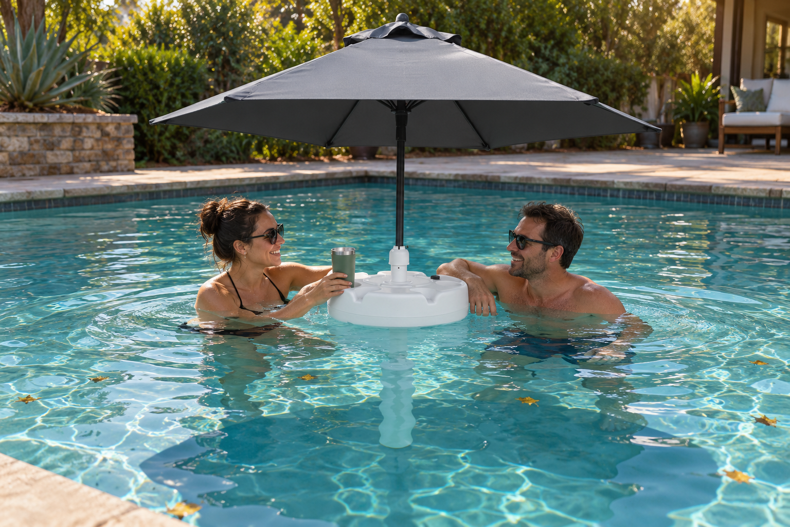 Floating pool umbrella set up by a pool