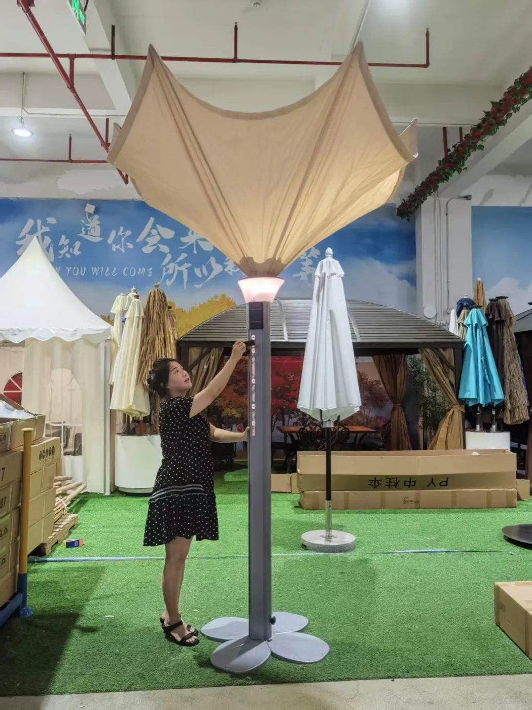 The umbrella set up with its torch light