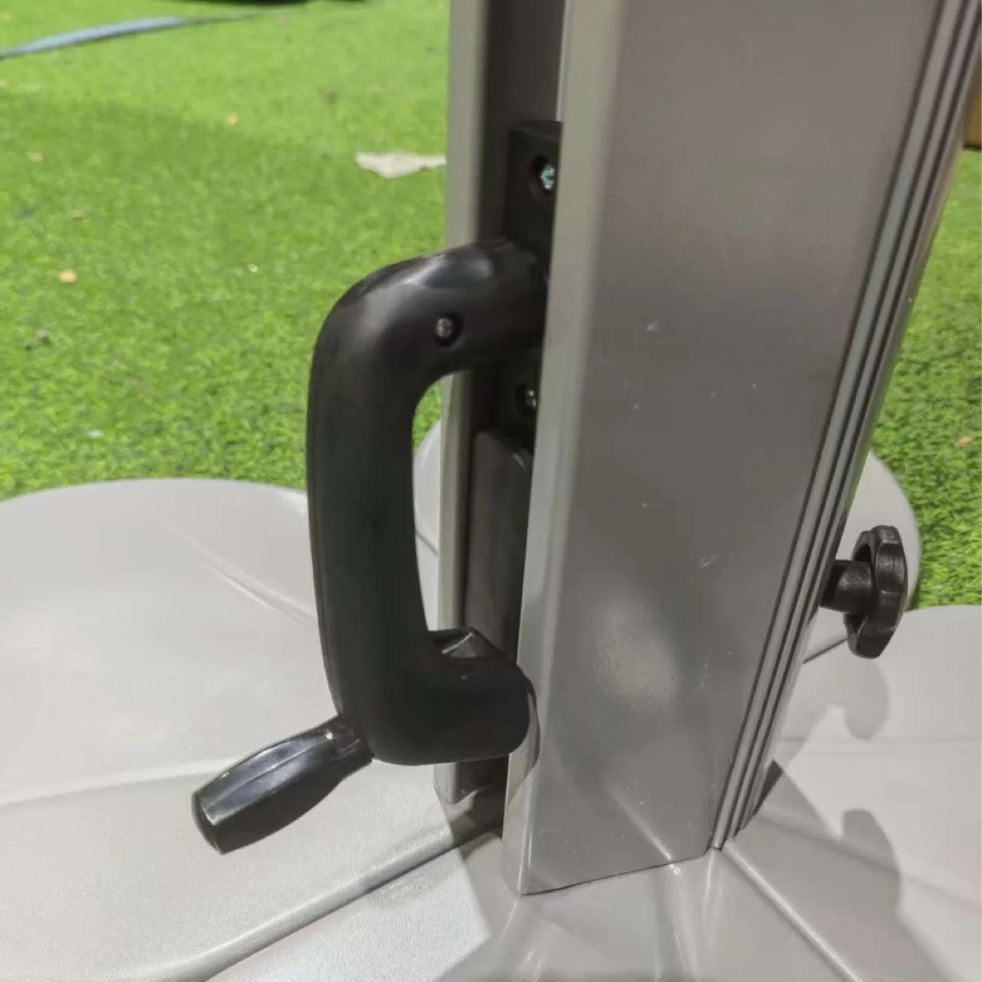 The crank handle that rotates the canopy
